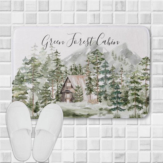 Watercolorhuisje in het groene dennenbos badmat