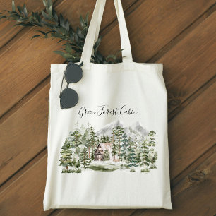 Watercolorhuisje in het groene dennenbos tote bag