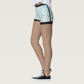 Waterdruppelaar korte blauwe leggings in het beenw (Links)