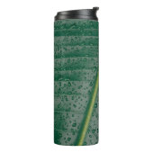 Waterdruppels op bananenblad thermosbeker (Gedraaid links)