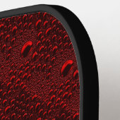 Waterdruppels op Crimson Metal Pickleball Paddle (Links Detail)