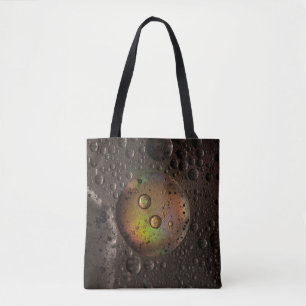 Waterdruppels op een glazen plaat tote bag