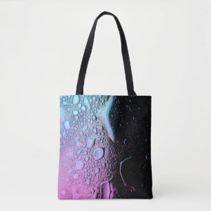 Waterdruppels op een glazen plaat tote bag