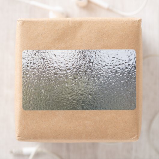 Waterdruppels op glas etiket (Insitu)