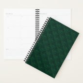 Waterdruppels op groen metaal planner (Display)