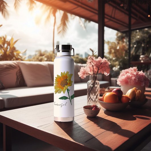 Waterfles met zonnebloempitten, geel waterachtig