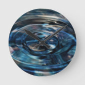 Waterklok van de dichter Adiela Akoo Ronde Klok (Voorkant)