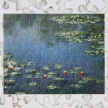 Waterlioenen van Claude Monet,  bloemen Legpuzzel<br><div class="desc">Water Lilies (1906) van Claude Monet is een impressionisme in het kunstlandschap schilderij. Het is een van de vele variaties van waterlelie schilderijen die Monet schilderde in zijn bloemtuin in Giverny, Frankrijk. Waterlelijke bloemen in een veerseizoen vijver. Over de kunstenaar: Claude Monet (1840-1926) was een oprichter van de Franse impressionistische...</div>