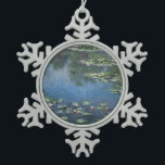 Waterlioenen van Claude Monet,  bloemen Tin Sneeuwvlok Ornament<br><div class="desc">Water Lilies (1906) van Claude Monet is een impressionisme in het kunstlandschap schilderij. Het is een van de vele variaties van waterlelie schilderijen die Monet schilderde in zijn bloemtuin in Giverny, Frankrijk. Waterlelijke bloemen in een veerseizoen vijver. Over de kunstenaar: Claude Monet (1840-1926) was een oprichter van de Franse impressionistische...</div>
