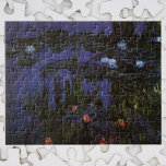 Waterlioenen van Claude Monet,  impressionisme Legpuzzel<br><div class="desc">Waterlilies (1915) van Claude Monet is een impressionisme, een kunstschilderij van fijne natuur. De donkerste tonen impliceren dat hij dit meesterwerk 's nachts schilderde. Een van de vele waterlelie schilderijen die Monet schilderde in zijn lenteseizoen bloemtuin in Giverny, Frankrijk. Over de kunstenaar: Claude Monet (1840-1926) was een oprichter van de...</div>