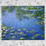 Waterlioenen van Claude Monet,  Kunst Legpuzzel<br><div class="desc">Waterlivons van Claude Monet is een kunstschilderij met een kunstschilderij met waterlappen in een vijver in de tuin van Monet in zijn huis in Giverny, Frankrijk. Een zonnige lente of zomerdag met de heldere blauwe hemel die in de vijver reflecteert. Claude Monet genoot van het schilderen "en plein air" of...</div>