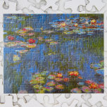 Waterlioenen van Claude Monet,  Natuur Kunst Legpuzzel<br><div class="desc">Waterliezen van Claude Monet zijn een schilderij met een kunstschilderij van het impressionisme, met waterloperbloemen in een vijver in de tuin van Monet in zijn huis in Giverny, Frankrijk. Mooie bloemen drijven in het water en groene weepende wilde bomen geven een reflectie. Claude Monet genoot van het schilderen "en plein...</div>