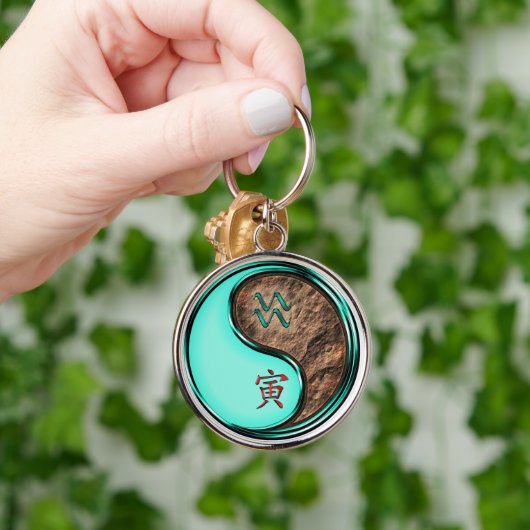 Waterman en aarde tijger sleutelhanger (Hand)