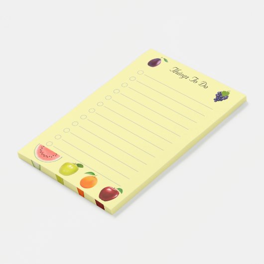 Watermeloen appel- en druiventeelt op geel papier post-it® notes (Schuin)