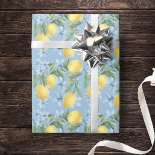 Waterverf citroen en bloemen in blauw cadeaupapier