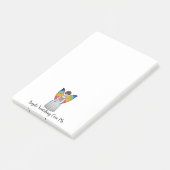 Waterverf engel met regenboogvleugels die een boek post-it® notes (Schuin)