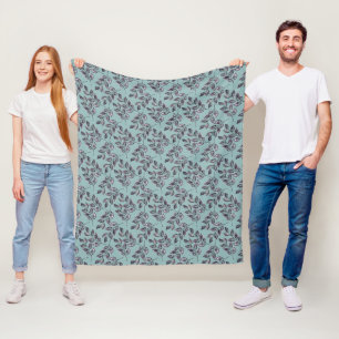 Waterverf grijs, zwarte twijgen op een turquoise fleece deken