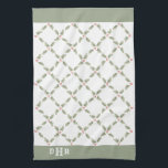 Waterverf Holly Monogrammed Kerstrood Groen Theedoek<br><div class="desc">Voeg een elegante aangepaste touch toe aan decoraties van vakantiehuizen met een monogram keukenhanddoek voor Kerstmis. De initialen op deze sjabloon zijn eenvoudig te personaliseren of te verwijderen. Het ontwerp is voorzien van kunstzinnige waterverf hulst bladeren en bessen in groen en rood op een eenvoudige witte achtergrond. Met een stijlvol...</div>