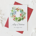 Waterverf Juniper en Holly Wreath Kerstmis Feestdagenkaart<br><div class="desc">vrolijk kerstfeest! Stuur uw vakantiebericht naar familie en vrienden met deze feestelijke aquarel kerstkaart. Het beschikt over een aquarel krans van winterbessen en groen. Personaliseer deze botanische vakantiekaart met uw gegevens. Deze aquarel kerstkaart is beschikbaar op andere karton. Overeenkomende objecten zijn beschikbaar.</div>