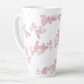 Waterverf maakt drijvende riemen roze latte mok (Linkerhoek)