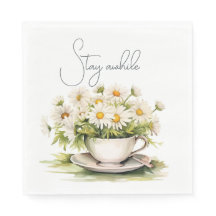 Waterverf madeliefjes in koffiekopje met tekst