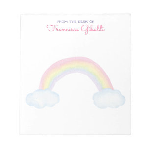 Waterverf regenboog en wolken van het bureau van notitieblok