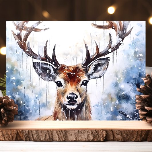 Waterverf rendieren in de sneeuw feestdagen kaart