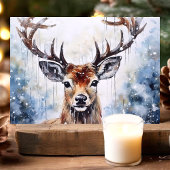 Waterverf rendieren in de sneeuw feestdagen kaart