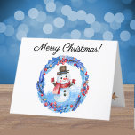 Waterverf Retro Snowman Krans Vrolijk Kerstfeest Feestdagen Kaart<br><div class="desc">Een leuke, grillige Merry Christmas winterkaart met een retro sneeuwpop ingelijst in een rode bessen, gouden sterren en blauwe bladeren versierde krans. Verander eenvoudig de stijlvolle scripttekst aan de voor-, binnen- en achterkant om deze van u te maken met behulp van de meegeleverde Sjabloon. Witte envelop is inbegrepen of markeer...</div>