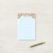 Waterverf roze bloemen hebben dingen te doen post-it® notes (Op bureau)