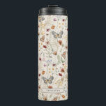 Waterverf thermische trommel thermosbeker<br><div class="desc">Deze stijlvolle boho kookpan thermische tumbler heeft een prachtige,  met de hand geschilderde waterverf van wilde bloemen en vlinders die in een mooi whimysisch patroon zijn gerangschikt met een naam die personaliserend is.</div>