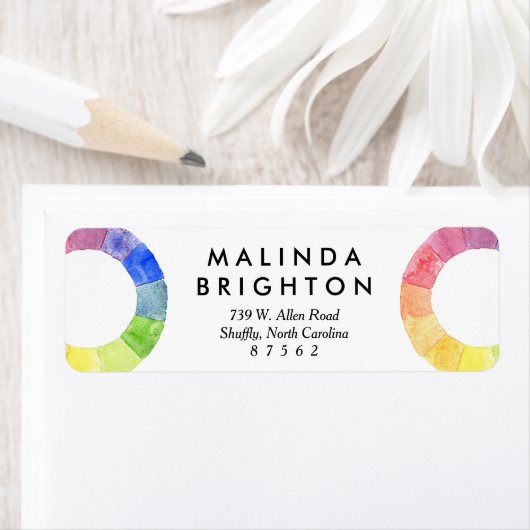 Waterverf van regenboog omringt moderne kleurrijke etiket (Insitu)