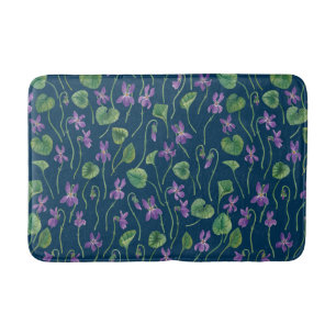 Waterverf viooltjes op blauw badmat