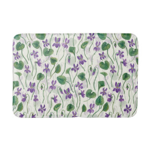 Waterverf viooltjes op wit badmat