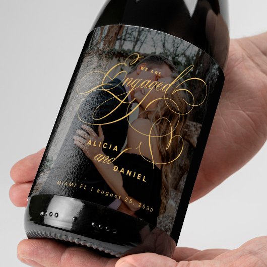 We are engaged gold script photo engagement party wijn etiket