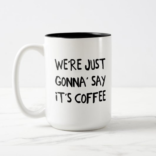 We gaan gewoon zeggen dat het koffie is tweekleurige koffiemok (Links)