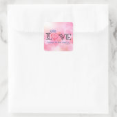 We houden omdat hij eerst van ons hield vierkante sticker (Tas)