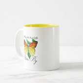 We mogen het leven niet laten afbrokkelen tweekleurige koffiemok (Voorkant links)