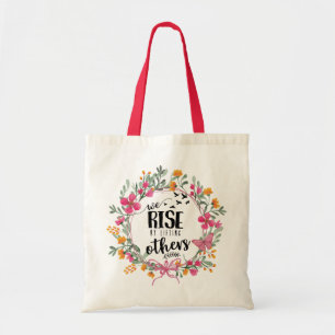 We verhogen door anderen op te heffen tote bag