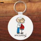 We verwachten T-shirts en cadeautjes Sleutelhanger (Voorkant)