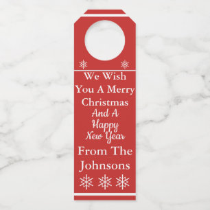 We wensen u een prettig kerstwijn Label. Flessenhanger