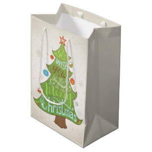 We wensen u een prettige kerstdag. medium cadeauzakje