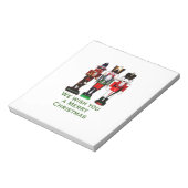 We wensen u een prettige kerstkrakers. notitieblok (Linkerzijde)