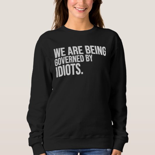 We Worden Beheerst Door Idioten Trui (Voorkant)