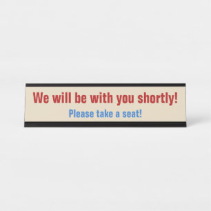 "We zullen binnenkort bij je zijn!" Bureau Naambordje