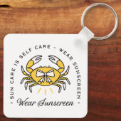 Wear sunscreen apply spf sun protection reminder sleutelhanger (Achterkant)