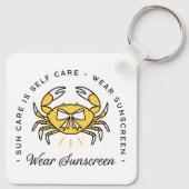 Wear sunscreen apply spf sun protection reminder sleutelhanger (Achterkant)