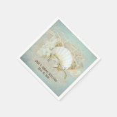 Weddenrennen en zeeschelpen in zand servet (Hoek)