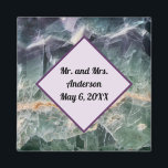 Wedding Ceremony Favor Fluorite Gem Foto Memento Magneet<br><div class="desc">Creëer een unieke huwelijksgunst met deze koelkast magneet. De achtergrond van deze magneet is voorzien van een prachtige close-upfoto van een paars, groen en geel gestreept stuk fluoretmineraal. Een diamant in het centrum maakt een stevige achtergrond mogelijk voor de bruid- en bruidenaam en trouwdatum. Zowel de tekst als de stevige...</div>