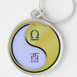 Weegschaal en metalen haan sleutelhanger